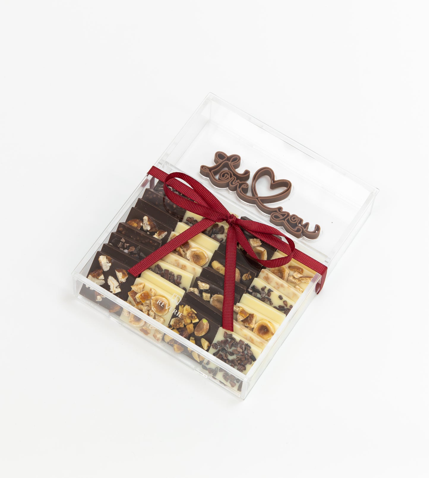 Luxury chocolates with nuts & cocoa nibs, wrapped with a "Love You" touch.