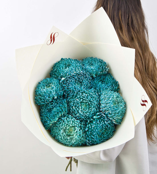 Teal Muse bouquet featuring elegant teal-toned flowers, perfect for stylish gifting or home decoration.