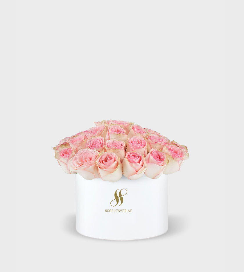 Pink Rose Small Round Box with 30 delicate pink roses, symbolizing grace, admiration, and heartfelt affection.