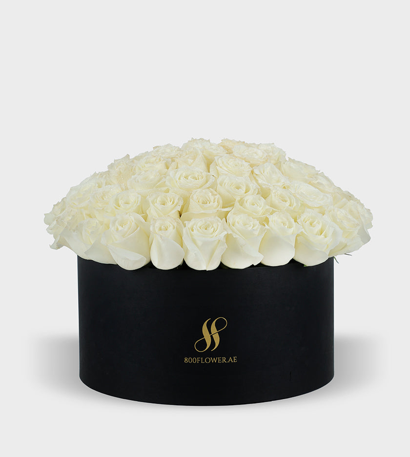 Red Rose Small Round Box with 30 meticulously arranged red roses, symbolizing passionate love, desire, and timeless affection.