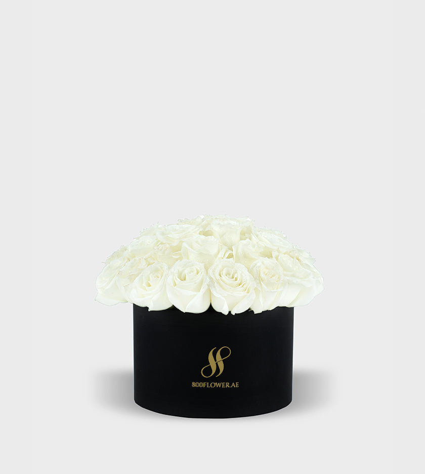 White Rose Small Round Box featuring 30 pristine white roses, elegantly arranged to symbolize purity, innocence, and heartfelt emotions.
