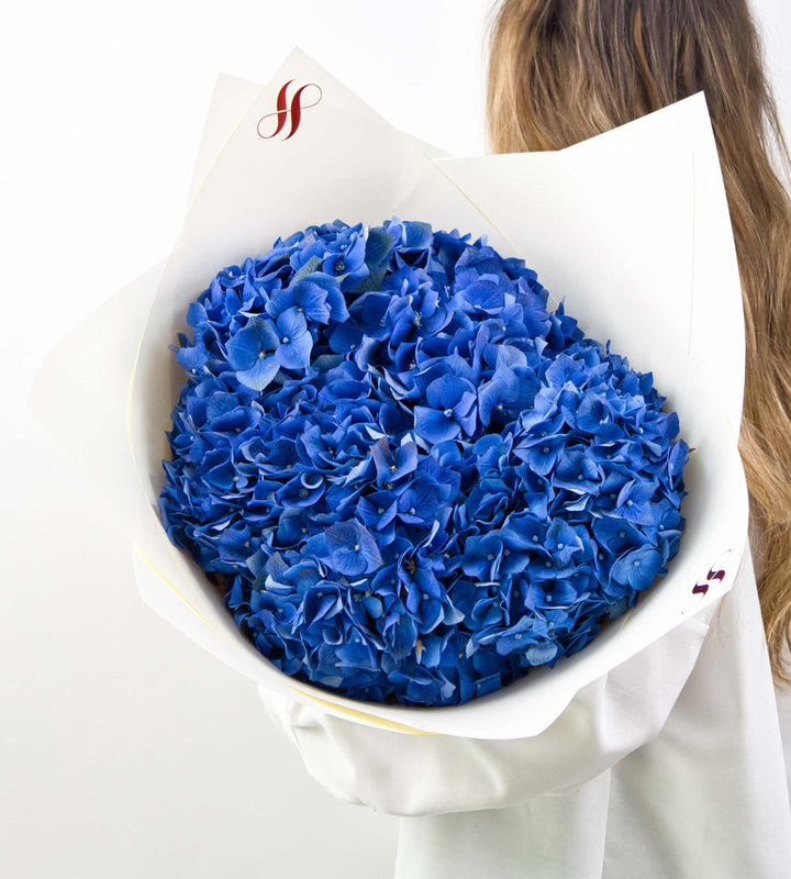 Blue Serenade single stem bouquet with striking blue blooms, ideal for gifting and special occasions.