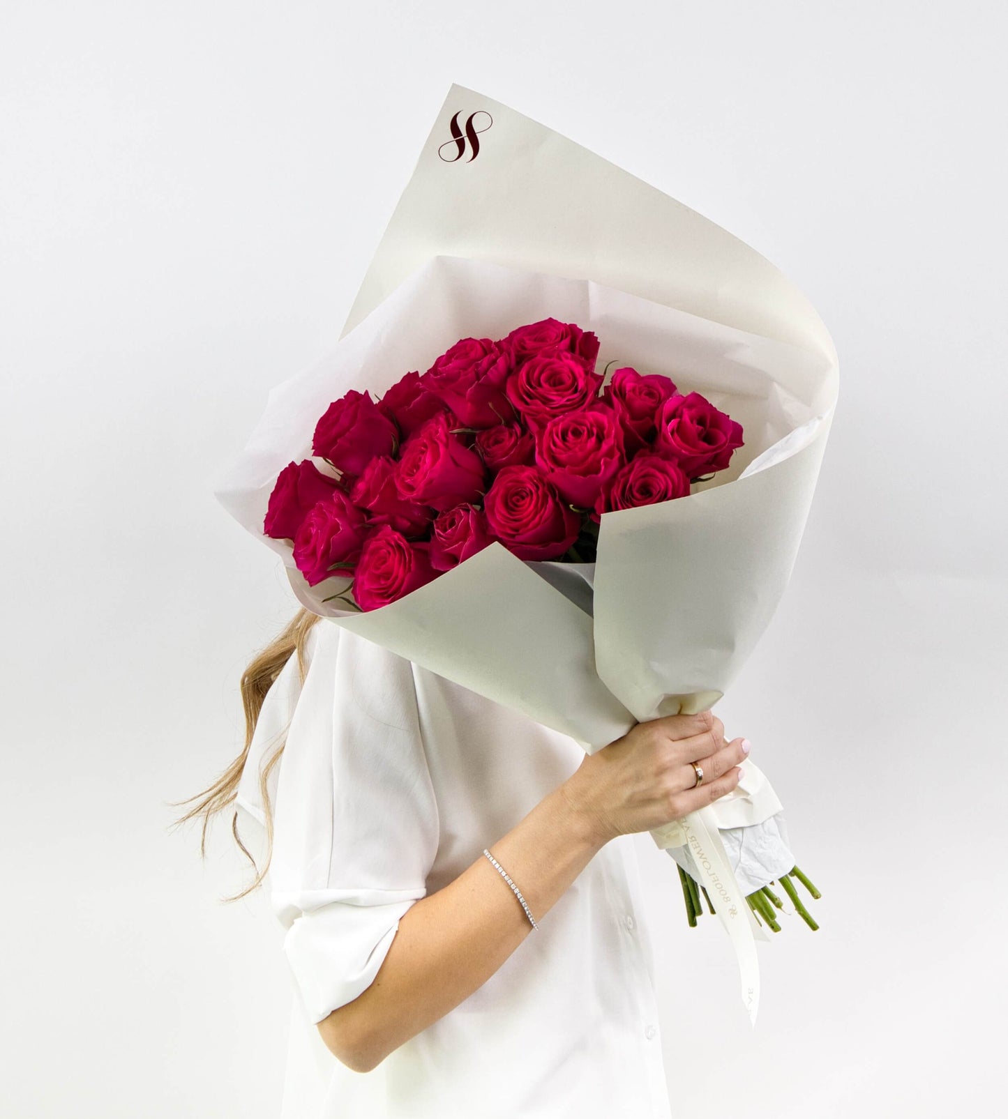 Bouquet of rich cerise roses, bold and vibrant, symbolizing confidence and modern romance.