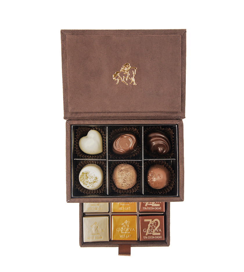 Luxurious GODIVA Mini Royal Box with 6 pralines and 12 Carrés in a velvet gift box.