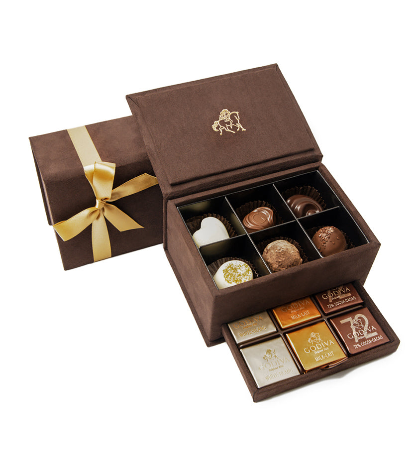Luxurious GODIVA Mini Royal Box with 6 pralines and 12 Carrés in a velvet gift box.