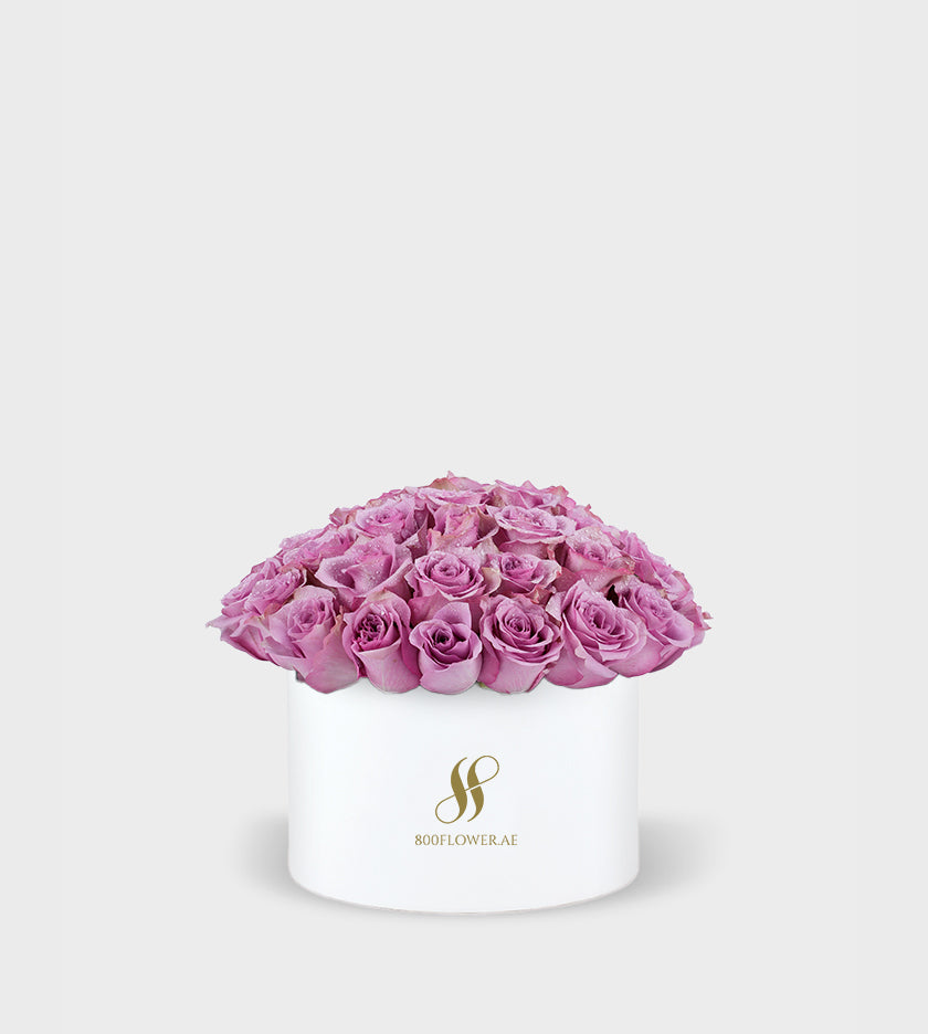White Rose Small Round Box featuring 30 pristine white roses, elegantly arranged to symbolize purity, innocence, and heartfelt emotions.