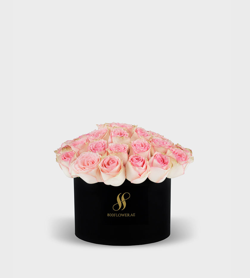Pink Rose Small Round Box with 30 delicate pink roses, symbolizing grace, admiration, and heartfelt affection.