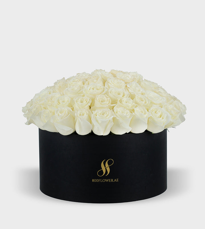 Red Rose Small Round Box with 30 meticulously arranged red roses, symbolizing passionate love, desire, and timeless affection.